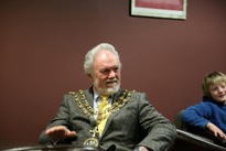 Dolphin-Centre Mayor-Lee listening-to-his-Mandolin
